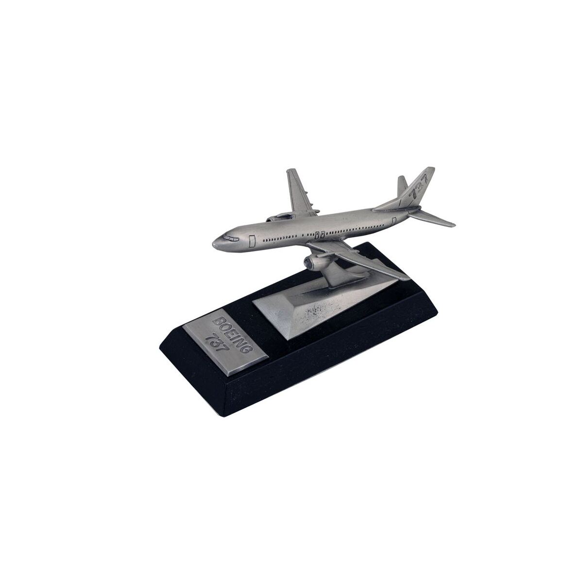 Close-up premium product photograph of a handcrafted pewter Boeing 737 desk model with an antique finish on a black wooden base, visible engraved pewter nameplate identifying Boeing 737, soft neutral background, subtle daylight, sharp focus on the model and base